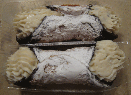 chocolate shelled cannoli with ricotta cheese filling
