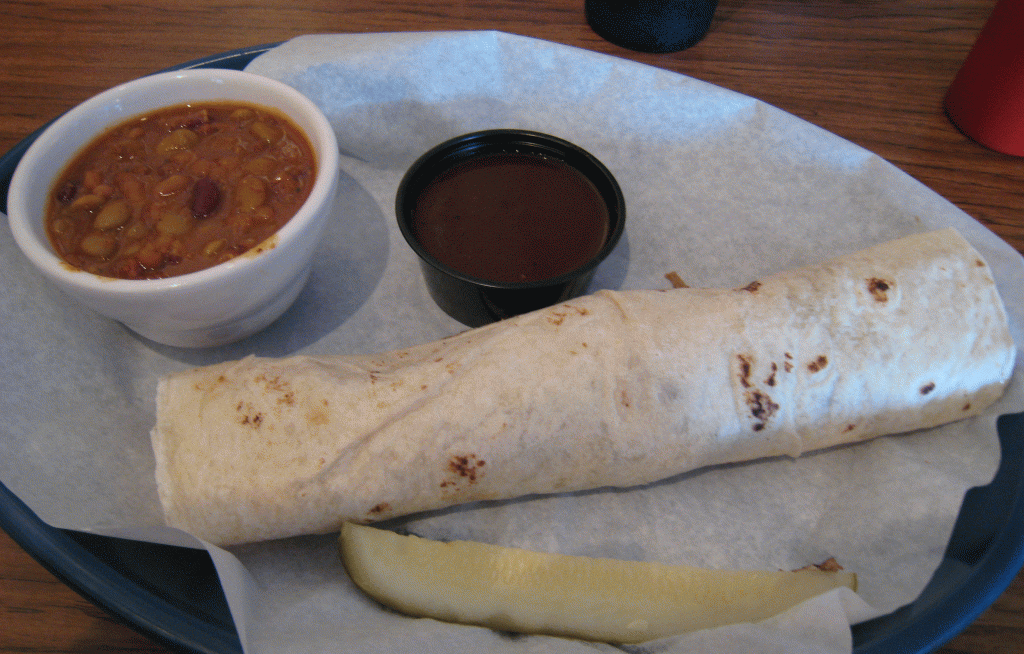 Pulled pork deliciousness wrapped inside a tortilla
