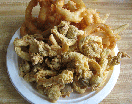 A feast of fried clams, onion rings and French fries